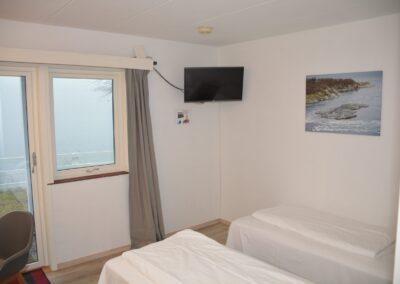 Rom med utsikt til fjorden